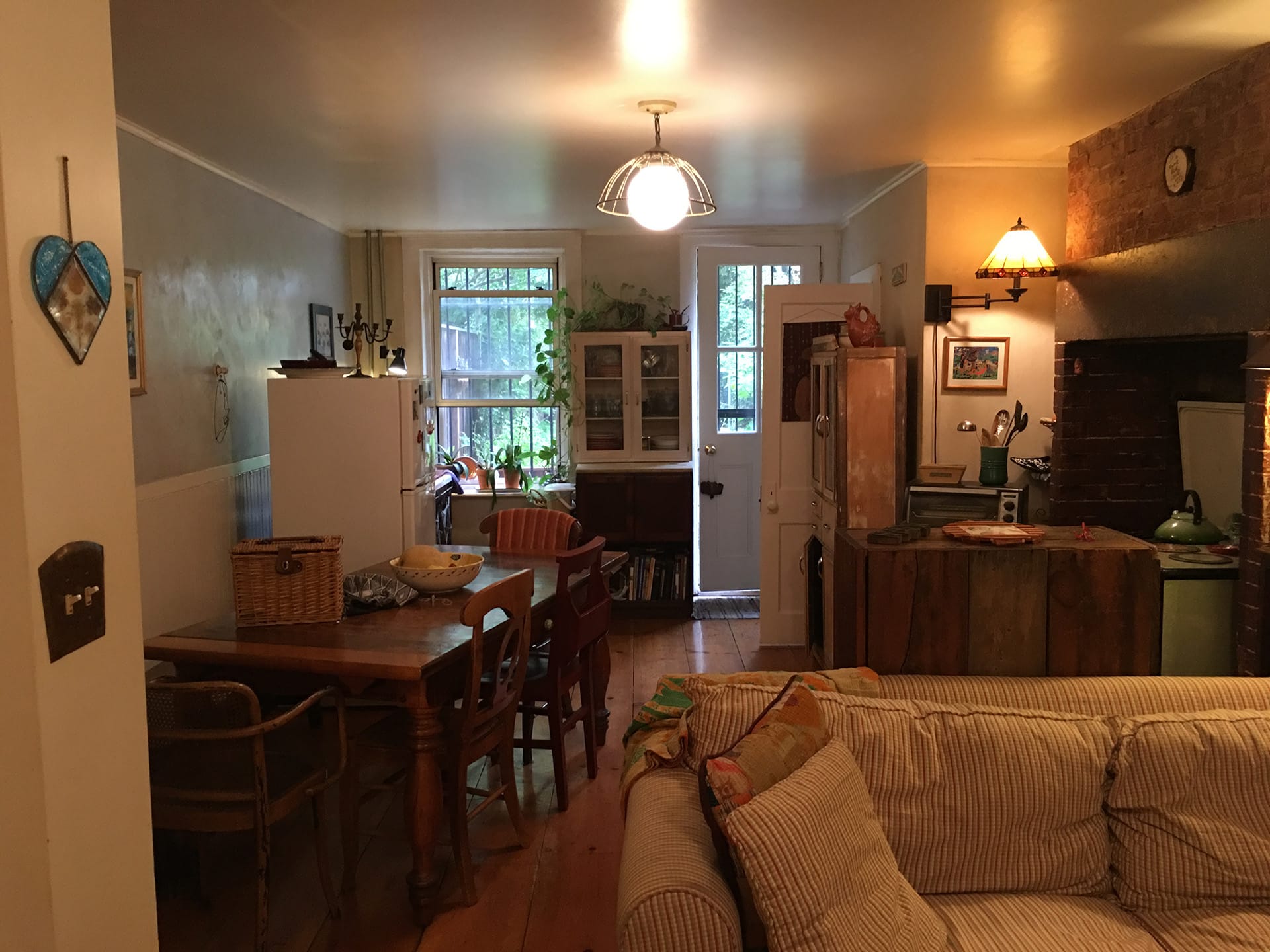 Garden floor of a Cobble Hill townhouse, with the kitchen and kitchen table at the rear.