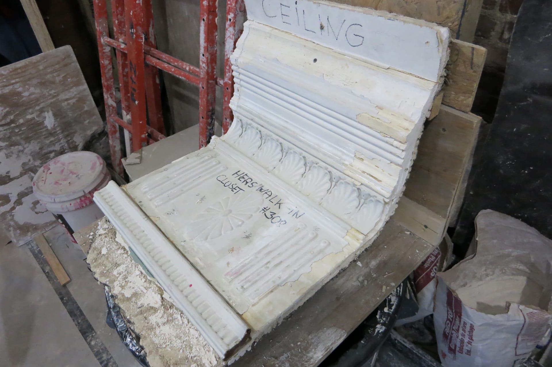 Original plaster crown molding recovered during the process of rehabilitating a prewar Beaux Arts townhouse in Manhattan's Upper West Side