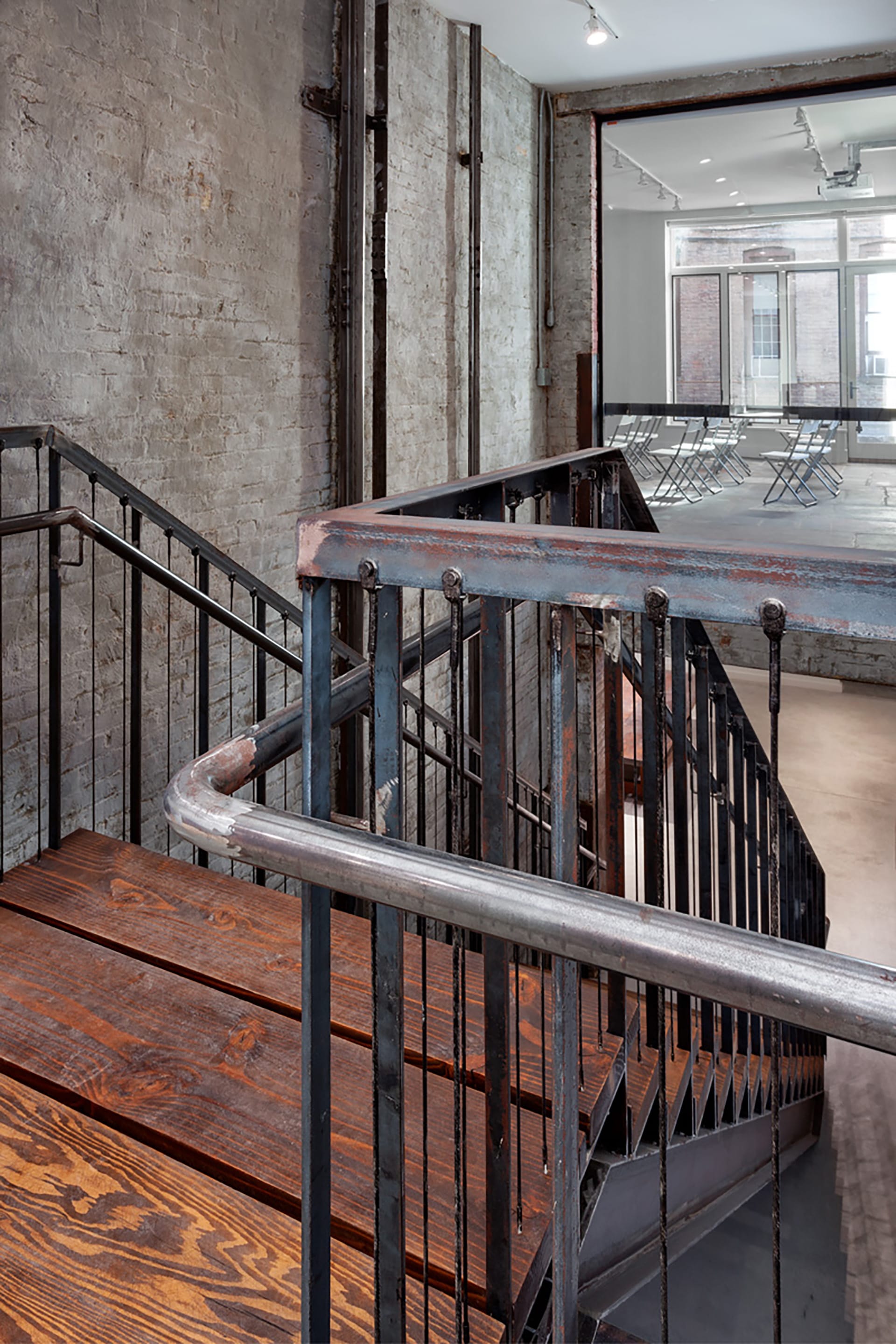 Wood and metal staircase in an old elevator shaft