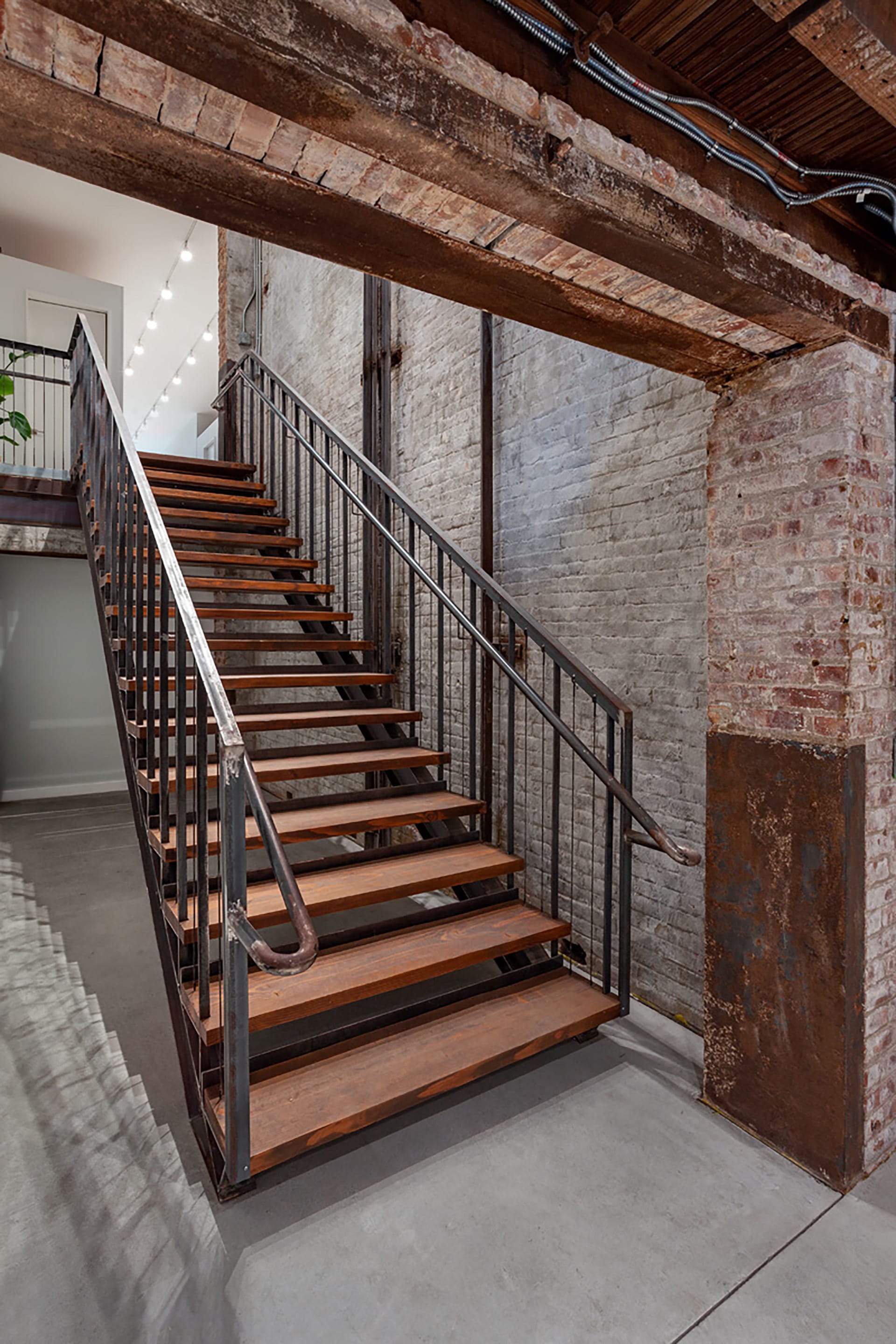 Staircase leading from the first floor to the cellar in a Brooklyn Heights building