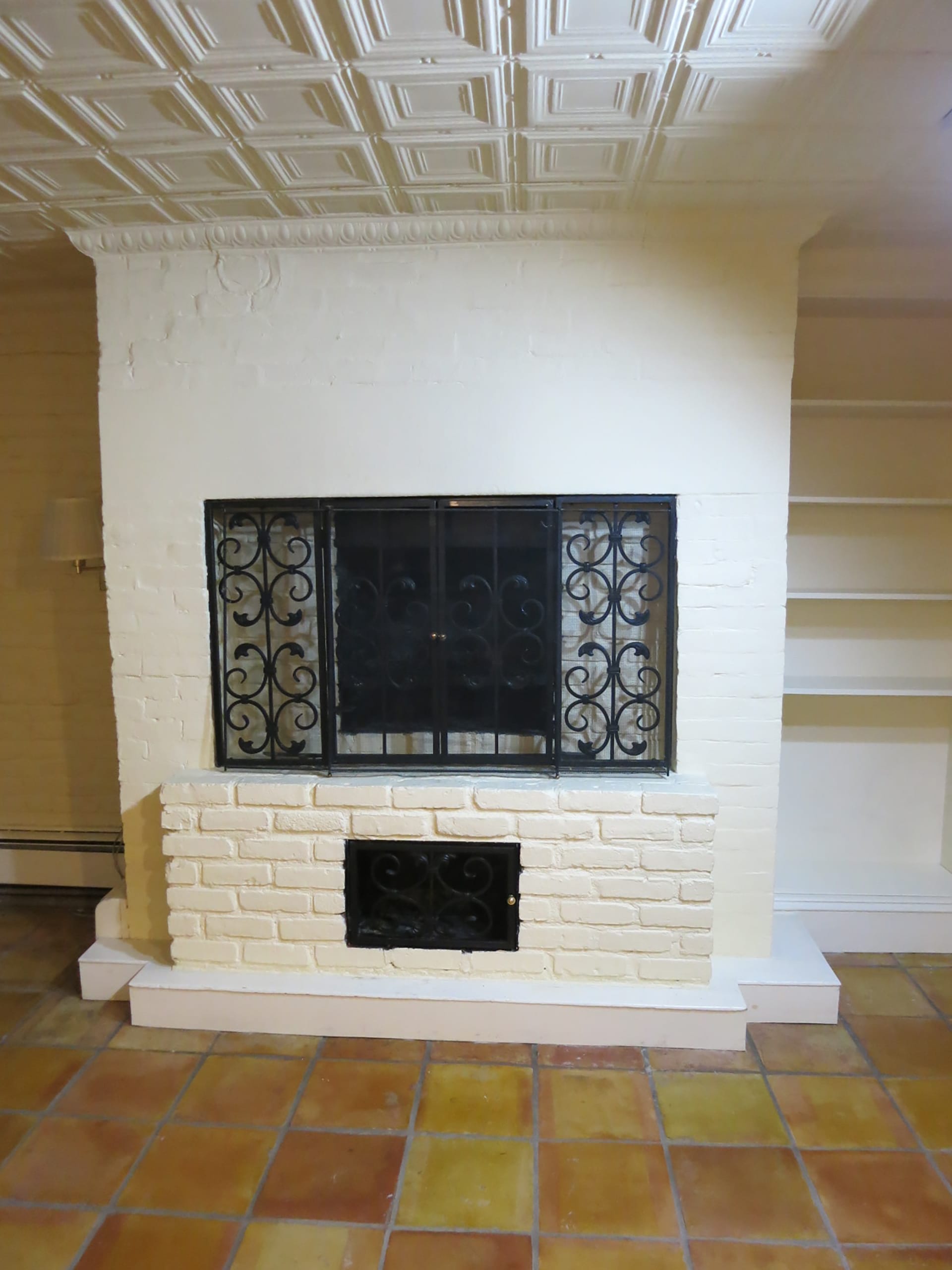 An original cooking fireplace in the basement of an 1840s Gothic Revival home in Brooklyn Heights, New York