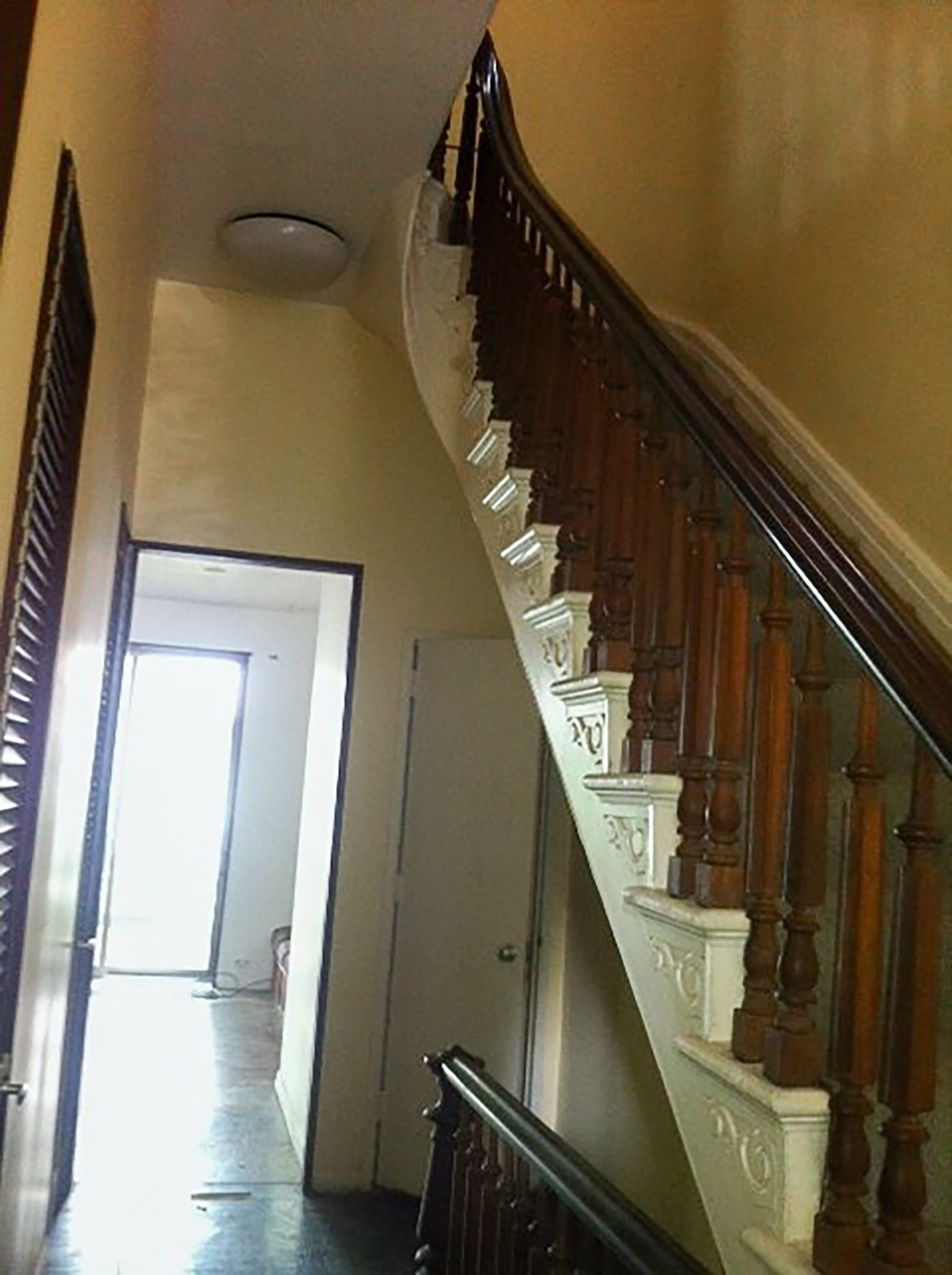 Staircase hallway leading to kitchen before our renovation