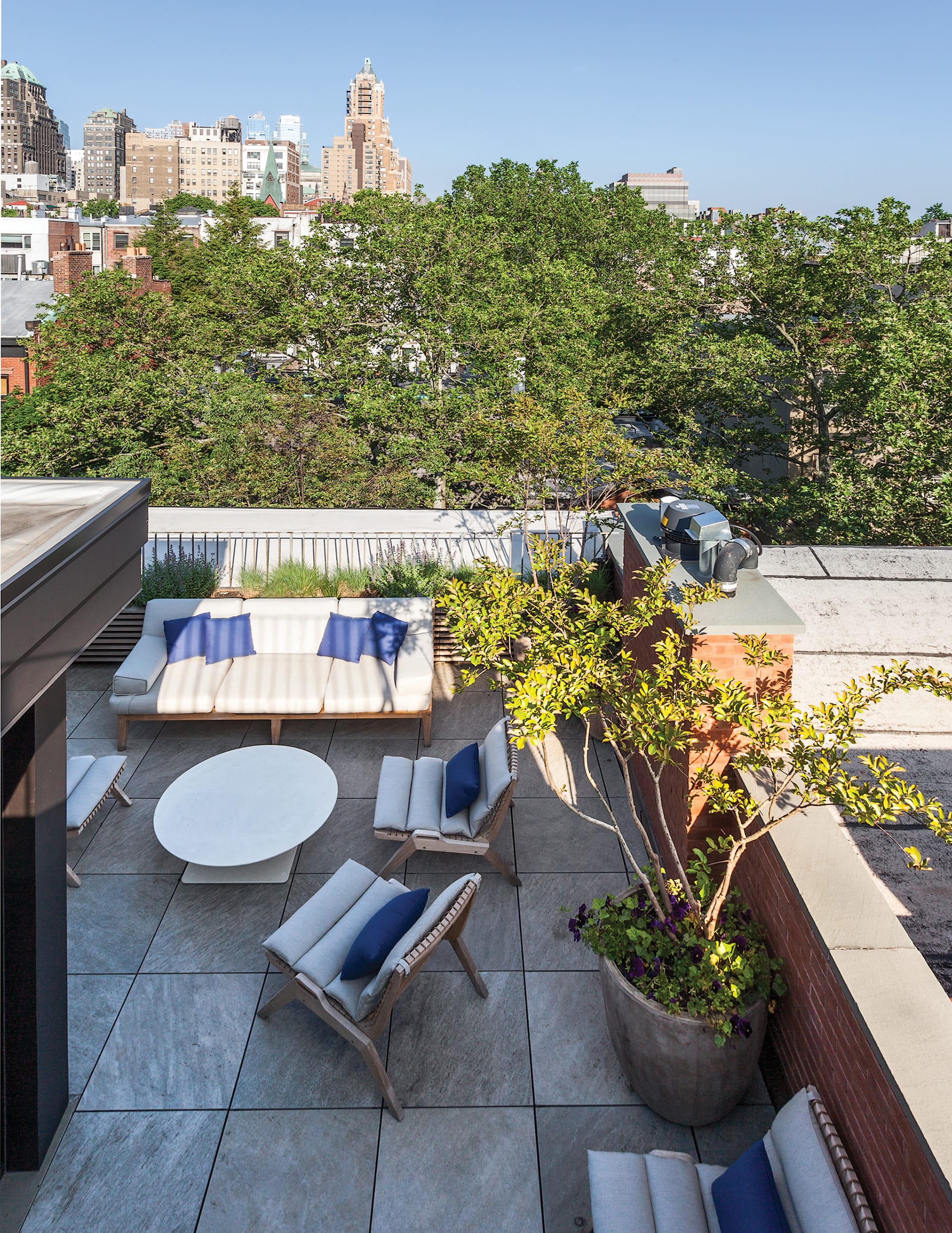 Roof deck with a view of the skyline in a Brooklyn Heights townhouse.
