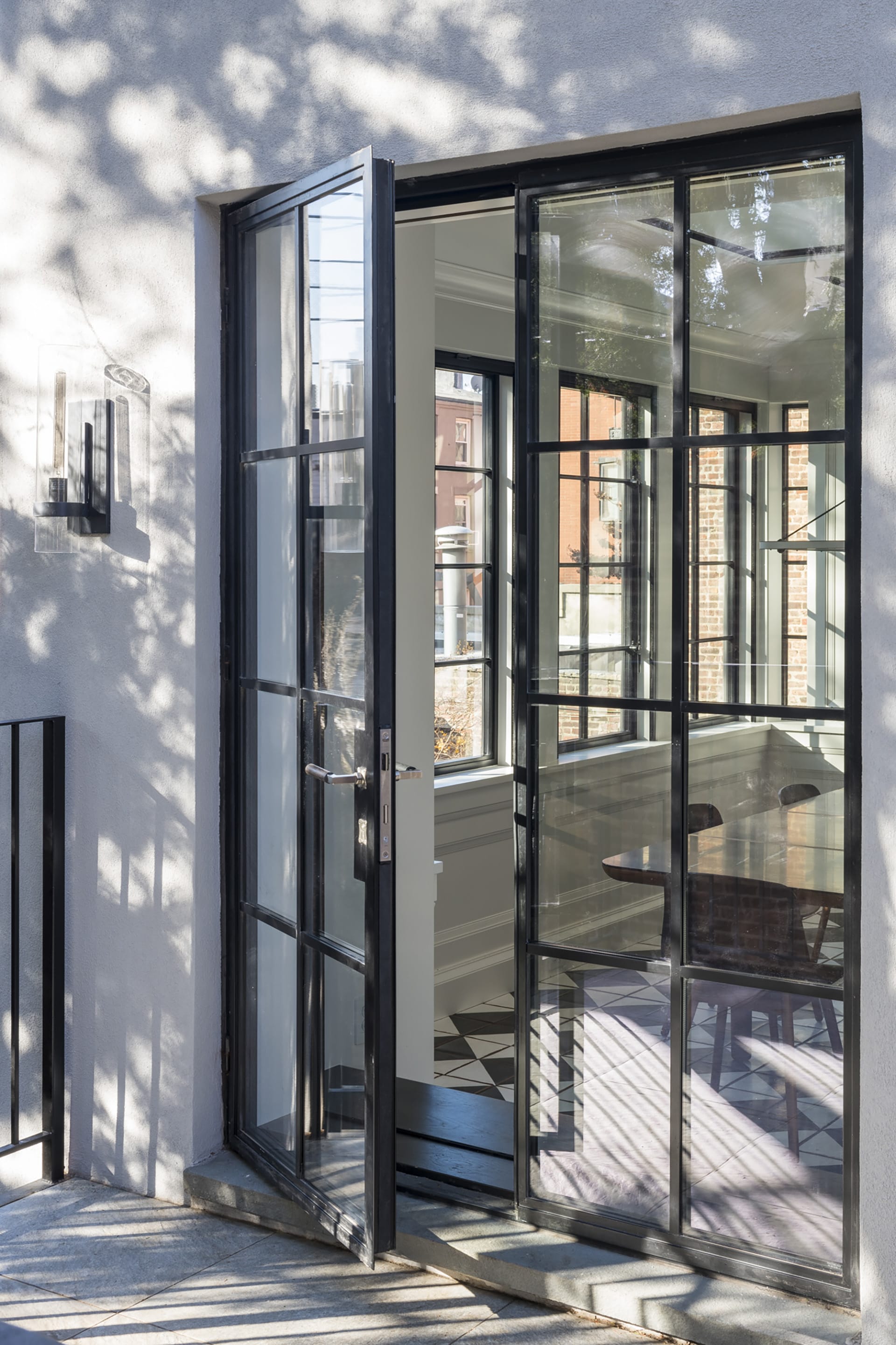 Glass doors leading to the rear yard of a Brooklyn Heights townhouse