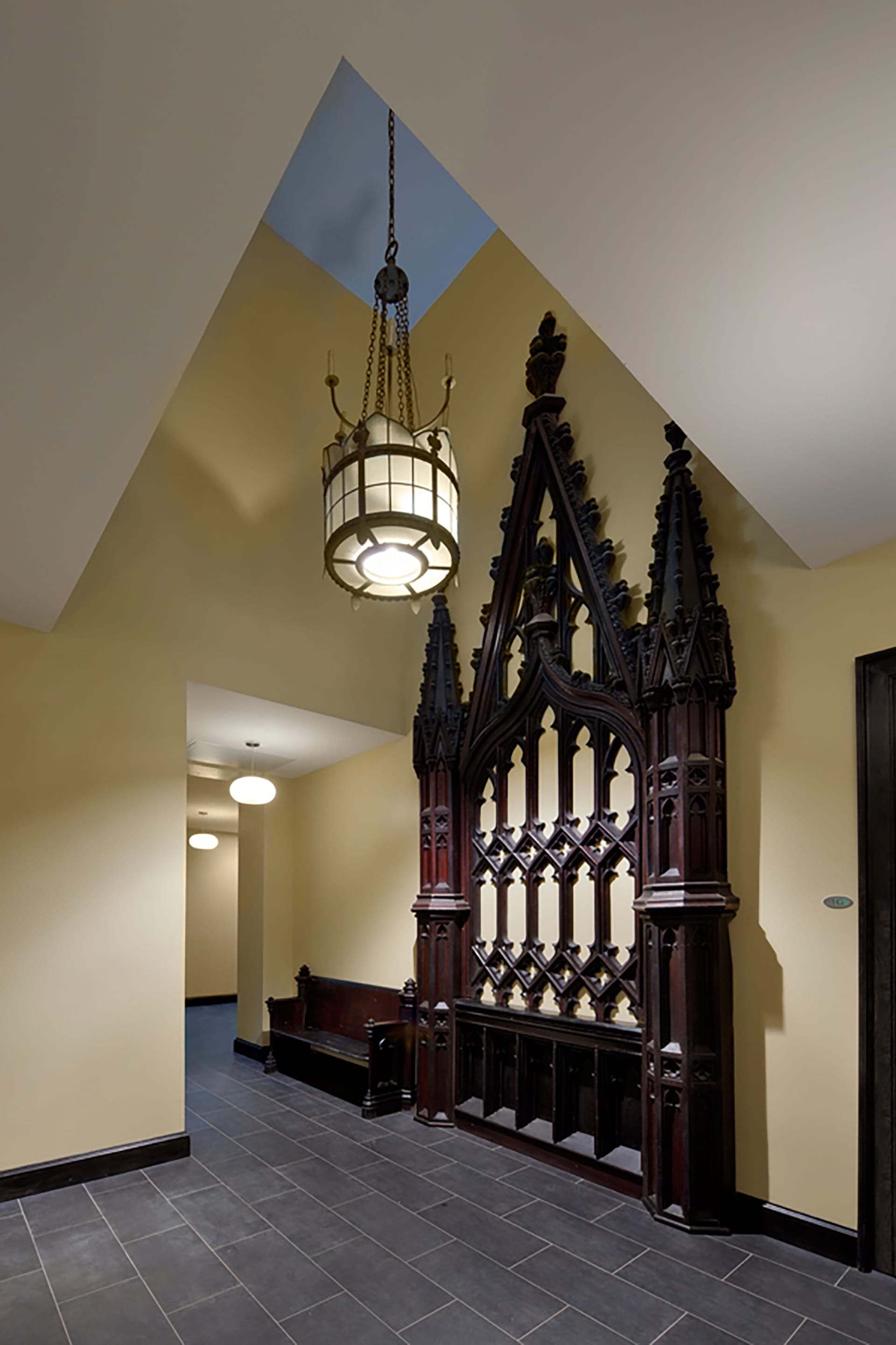 Hallway with preserved woodworking from the building's previous life as a church