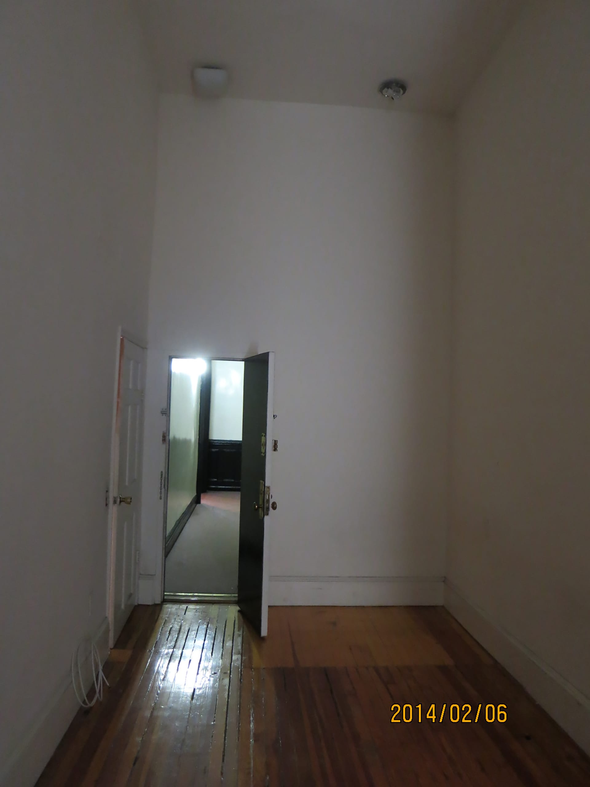 Stair hallway in a Brooklyn Heights Passive House before renovation.