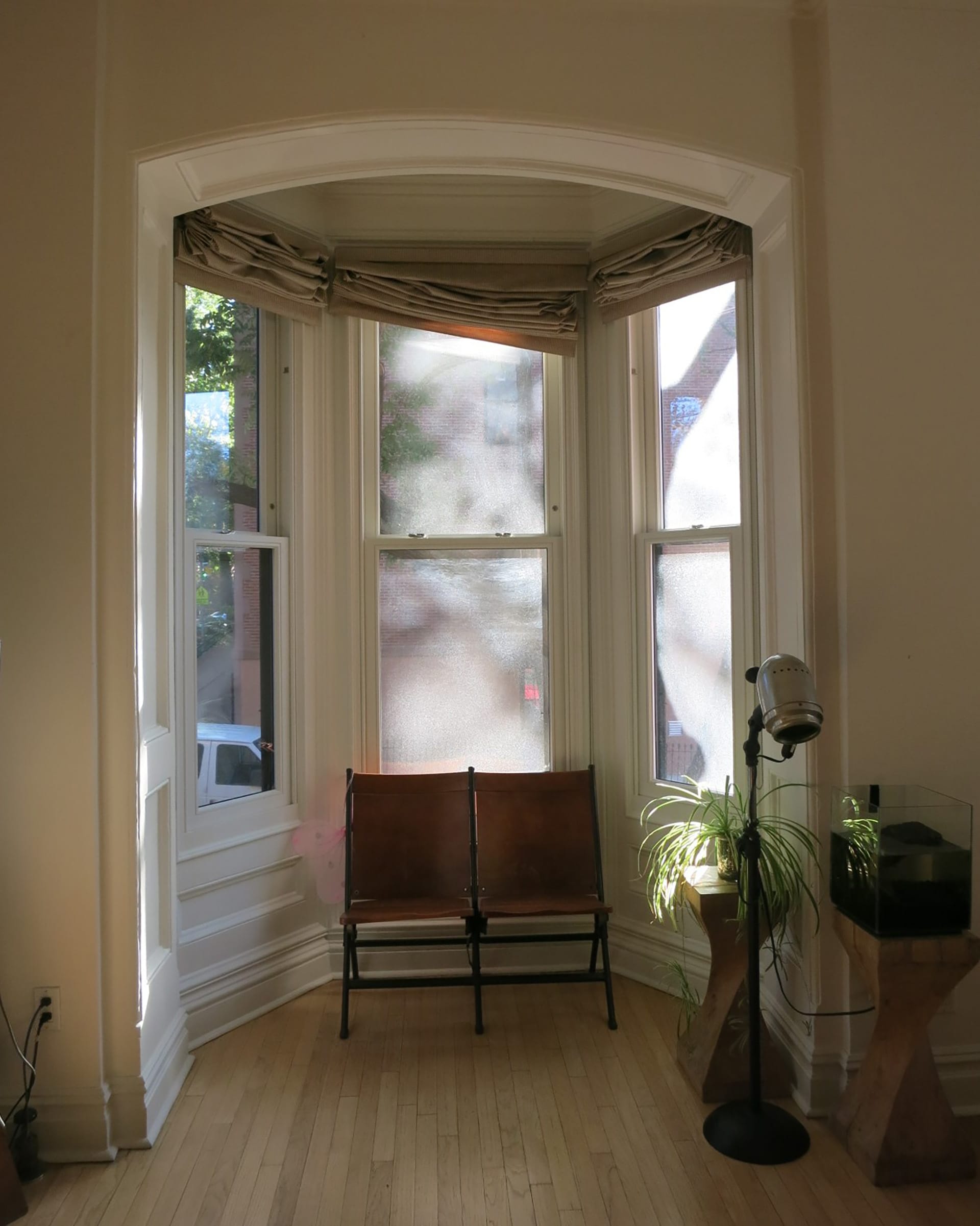 Bay window in the dining room of a Park Slope home before renovation