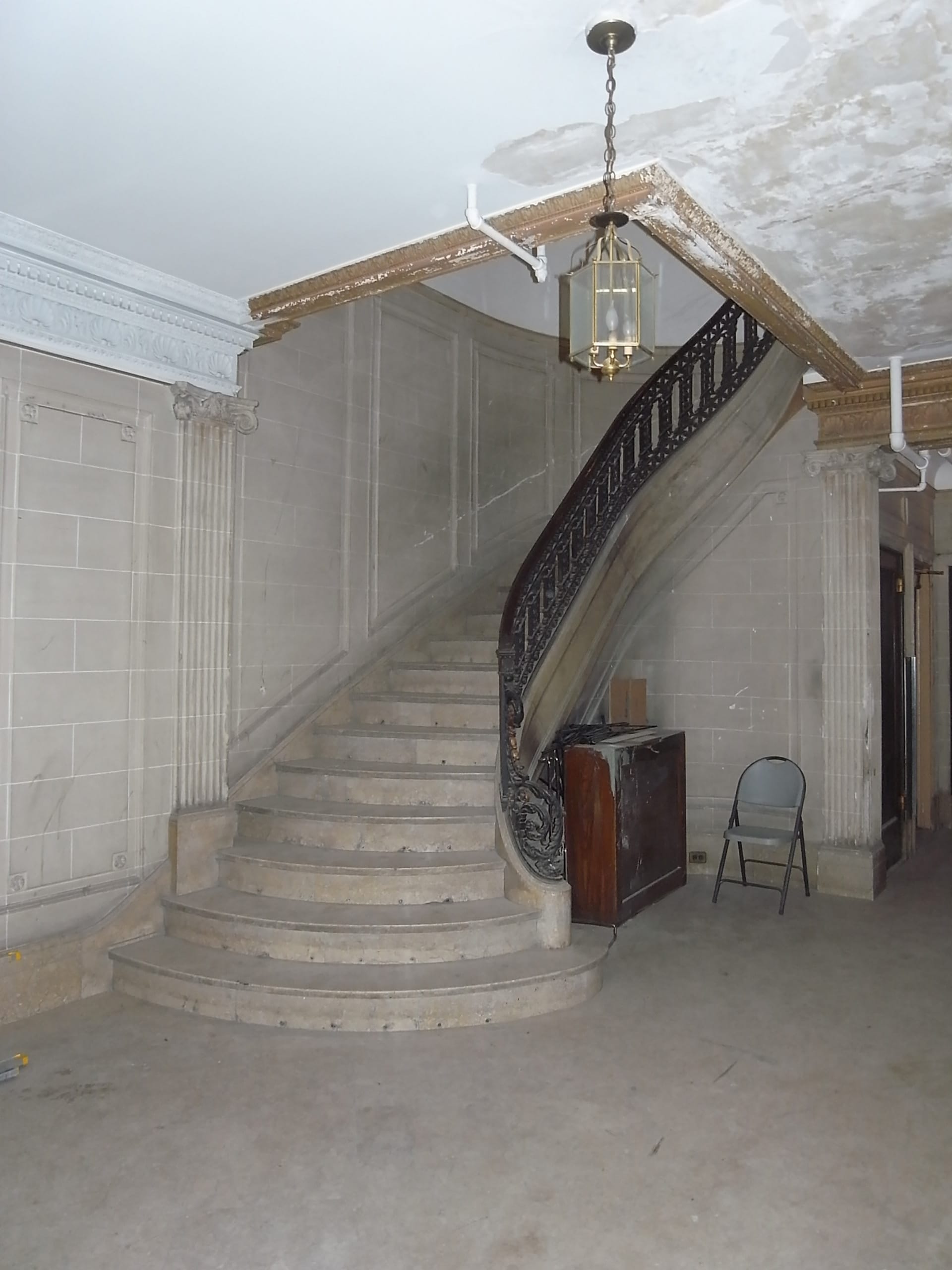 Grand entrance  of an Upper West Side mansion before our renovation.