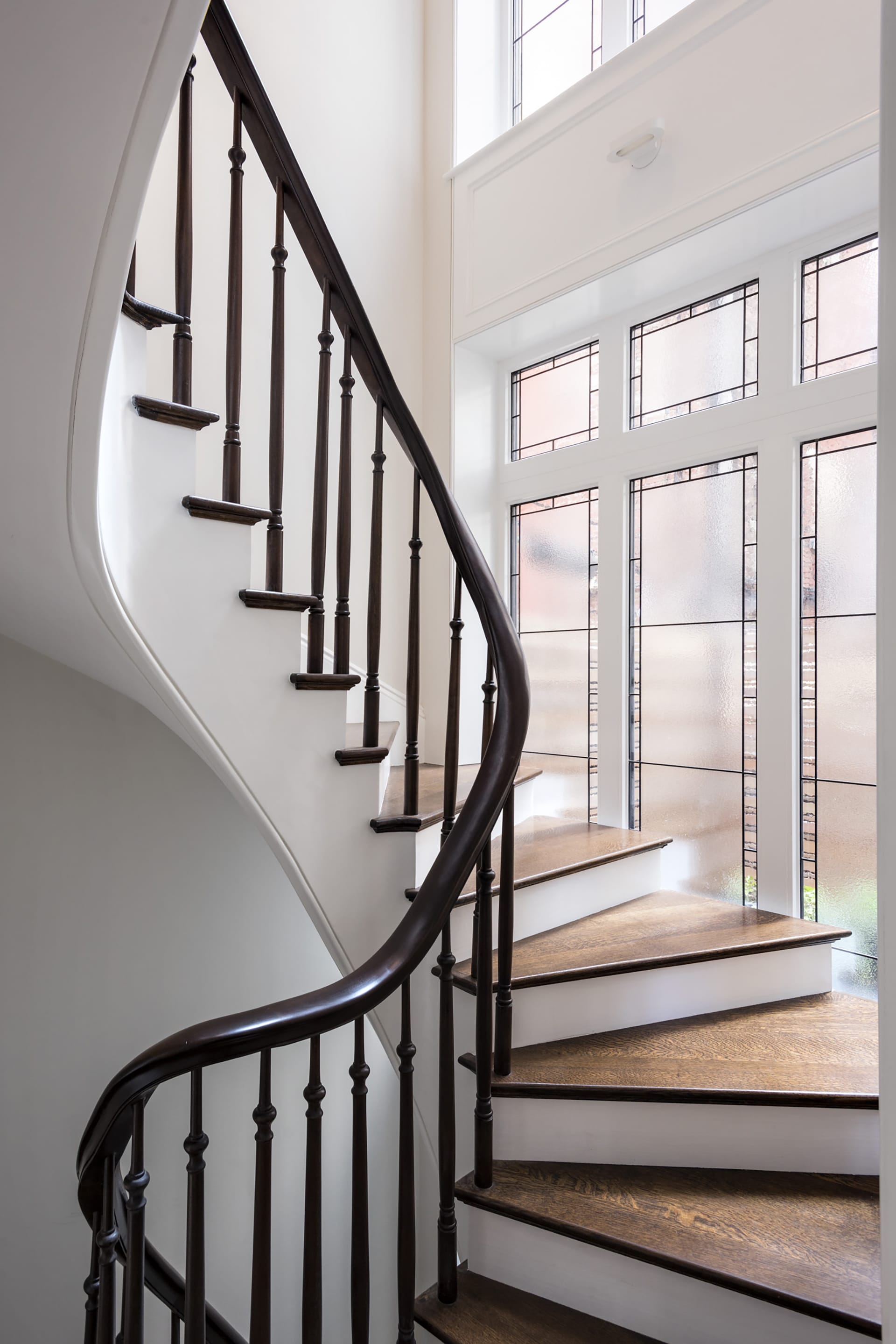 Rear sculptural staircase in an Upper West Side home.